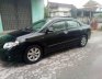 Toyota Corolla Altis 2009 - Cần bán xe Toyota Corolla Altis đời 2009, màu đen, giá tốt
