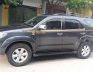 Toyota Fortuner 2011 - Cần bán gấp Toyota Fortuner sản xuất 2011, màu xám xe gia đình