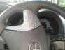 Toyota Corolla Altis 1.8G AT 2009 - Cần bán lại xe cũ Toyota Corolla altis 1.8G AT đời 2009, màu nâu như mới