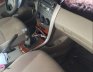 Toyota Corolla Altis 2009 - Cần bán gấp Toyota Corolla Altis đời 2009, màu bạc xe gia đình