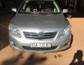 Toyota Corolla Altis 2009 - Cần bán gấp Toyota Corolla Altis đời 2009, màu bạc xe gia đình