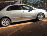 Toyota Corolla Altis 2009 - Cần bán gấp Toyota Corolla Altis đời 2009, màu bạc xe gia đình