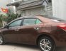 Toyota Corolla Altis   1.8 AT  2015 - Cần bán Toyota Corolla altis 1.8 AT năm 2015, màu nâu