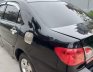 Toyota Corolla   2003 - Gia đình bán xe Toyota Corolla đời 2003, màu đen  