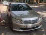 Toyota Camry 2013 - Cần bán Toyota Camry đời 2013, màu vàng, xe nhập chính chủ, 730 triệu