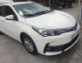 Toyota Corolla Altis 1.8E 2017 - Bán xe Toyota Corolla altis 1.8E sản xuất 2017, màu trắng chính chủ, 690 triệu