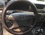 Toyota Corolla Altis 1.8G MT 2005 - Bán Toyota Corolla altis 1.8G MT sản xuất năm 2005, màu đen số sàn, giá chỉ 285 triệu