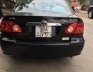 Toyota Corolla Altis   2003 - Cần bán gấp Toyota Corolla altis năm 2003, màu đen, xe đẹp 