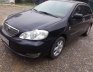Toyota Corolla Altis 1.8G MT 2004 - Bán xe Toyota Corolla Altis 1.8G MT năm sản xuất 2004, màu đen, giá chỉ 245 triệu