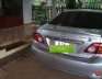 Toyota Corolla Altis 2010 - Cần bán lại xe Toyota Corolla Altis năm 2010, màu bạc xe gia đình, giá tốt