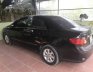 Toyota Corolla Altis   2010 - Bán Toyota Corolla altis sản xuất năm 2010, màu đen, xe nguyên zin chưa đâm đụng ngập nước