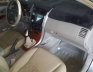 Toyota Corolla Altis 2010 - Cần bán lại xe Toyota Corolla Altis năm 2010, màu bạc xe gia đình, giá tốt