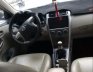 Toyota Corolla Altis   2010 - Bán Toyota Corolla Altis sản xuất 2010, màu đen chính chủ, giá tốt
