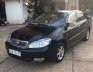 Toyota Corolla Altis  MT 2003 - Bán xe Toyota Corolla altis MT đời 2003, màu đen, xe nhập, xe gia đình sử dụng