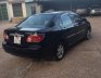 Toyota Corolla Altis  MT 2003 - Bán xe Toyota Corolla altis MT đời 2003, màu đen, xe nhập, xe gia đình sử dụng