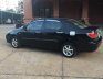 Toyota Corolla Altis  MT 2003 - Bán xe Toyota Corolla altis MT đời 2003, màu đen, xe nhập, xe gia đình sử dụng