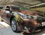 Toyota Corolla   2016 - Cần bán Toyota Corolla sản xuất 2016, màu nâu như mới
