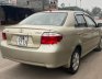 Toyota Vios 2003 - Bán Toyota Vios đời 2003, màu vàng xe gia đình