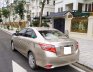 Toyota Vios 1.5E 2016 - Tôi cần bán chiếc xe ô tô Toyota Vios 1.5E màu ghi vàng 2016