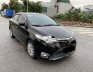 Toyota Vios 2015 - Cần bán gấp Toyota Vios G AT năm 2015, màu đen số tự động