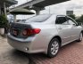 Toyota Corolla Altis 1.8G 2009 - Cần bán lại xe Toyota Corolla altis 1.8G đời 2009, màu bạc
