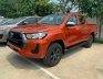 Toyota Hilux 2.4 4x2 AT 2021 - Toyota Hilux 2.4 AT 4X2 màu đỏ cam giao ngay tháng 11