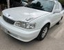 Toyota Corolla 1.8E MT 2001 - Cần bán gấp Toyota Corolla 1.8E MT năm 2001, màu trắng