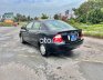 Toyota Corolla 2006 - Bán xe Toyota Corolla năm sản xuất 2006, màu đen, nhập khẩu, giá tốt