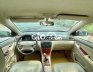 Toyota Corolla 2006 - Bán xe Toyota Corolla năm sản xuất 2006, màu đen, nhập khẩu, giá tốt