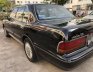 Toyota Crown 1993 - Cần bán xe màu đen, giá 140tr