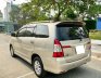 Toyota Innova 2.0 2014 - Bán xe Toyota 2014 xe màu vàng cát 2.0MT xe đẹp ít chạy có đăng ký kinh doanh.