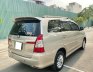 Toyota Innova 2.0 2014 - Bán xe Toyota 2014 xe màu vàng cát 2.0MT xe đẹp ít chạy có đăng ký kinh doanh.