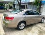 Toyota Camry 2.0G 2009 - Bán xe TOYOTA camry 2009, bản G, màu vàng cát còn mới cứng. xe gia đình sử dụng.