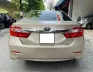 Toyota Camry 2.0E 2014 - Cần bán xe Toyota Camry 2.0E đời 2014, màu vàng