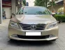 Toyota Camry 2.0E 2014 - Cần bán xe Toyota Camry 2.0E đời 2014, màu vàng